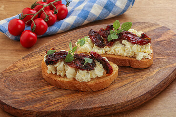 Bruschetta with soft cheese and tomato