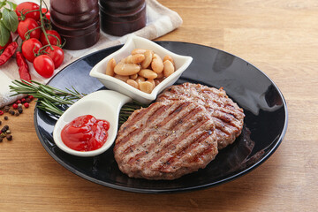 Grilled beef burger cutlet with sauce