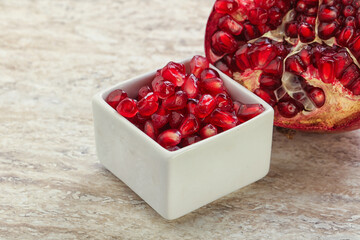 Ripe red Pomegranate seeds in the bowl