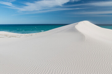 white sand dune with the Indian Ocean in the background, De Hoop Nature Reserve, Overberg, South Africa