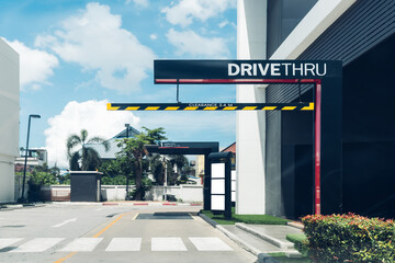 Drive thru sign in fast food restaurant. Drive thru sign into the shop. Drive through and takeaway for buy fast food for protect covid19 Concept.