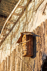 Concept shot of the wooden birdhouse. Outdoor