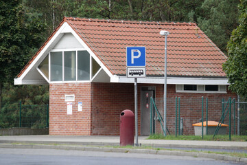 Restrooms at rest area on Germany  highway. Parking for bus and toilets 
