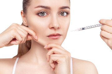 Beautiful woman has an injections on cheekbones.