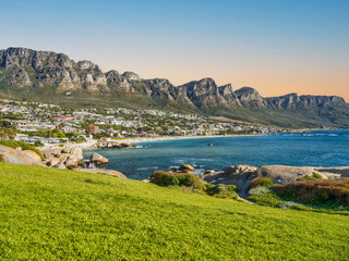 Camps bay, and the Twelve Apostles mountain on atlantic ocean from Fourth Beach, Clifton, Cape Town, South Africa