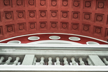 Architecture in Ukraine. Red ceiling of the arch at the entrance to the house of culture and creativity.