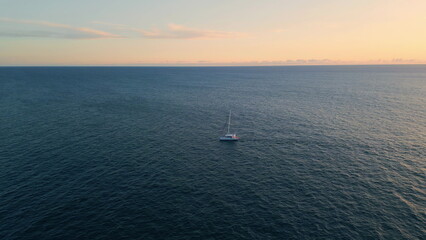 Luxury schooner sailing ocean at serene day. White yacht swimming at marine bay