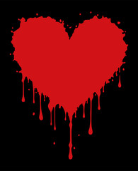 Red heart. Romantic symbol red heart on a black background. Splashes of red liquid in the shape of a heart.