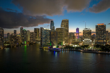 Fototapeta na wymiar Aerial view of downtown district of of Miami Brickell in Florida, USA. Brightly illuminated high skyscraper buildings in modern american midtown