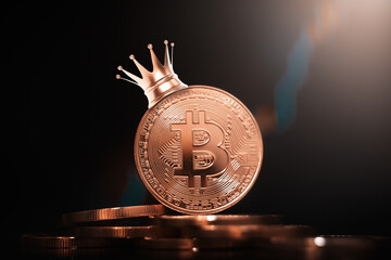 Leader of the BTC cryptocurrency. Bitcoin in a crown on a black background. Bitcoin chart shows growth.
