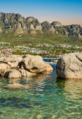 Foto auf Acrylglas Camps Bay Beach, Kapstadt, Südafrika Camps bay beach town, and the Twelve Apostles mountain on atlantic ocean from Fourth Beach, Clifton, Cape Town, South Africa