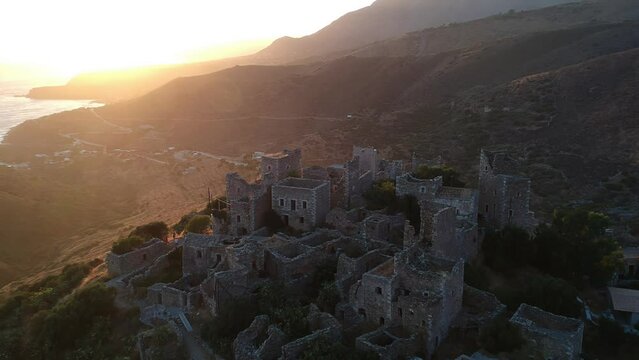 Aerial view of Vathia village against a Dramatic sunset sky. Vathia, Mani, Laconia, Peloponnese, Greece