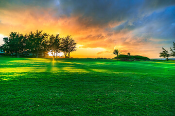 Sunset over the golf field in Maui, Hawaii, USA - Powered by Adobe