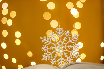 Glitter snowflake in an open book. Magical fairy tale concept. Christmas  background