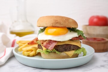 Delicious burger with fried egg and french fries served on white marble table, closeup
