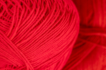 woolen threads of red color for knitting knitting close-up
