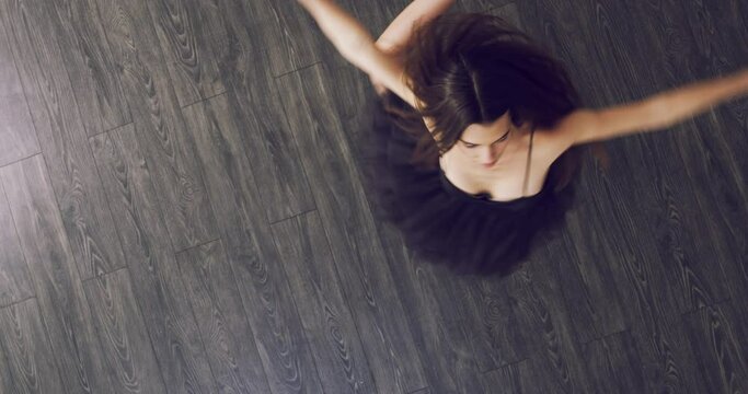 Top view, ballet and woman talent, spin and fitness with performance, training and wellness with breathing. Person, performer and dancer with artist, studio and ballerina with exercise and practice