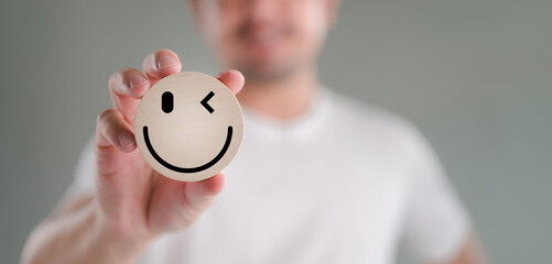 Wooden label with happy smile relax face, good feedback rating, think positive, customer review,...