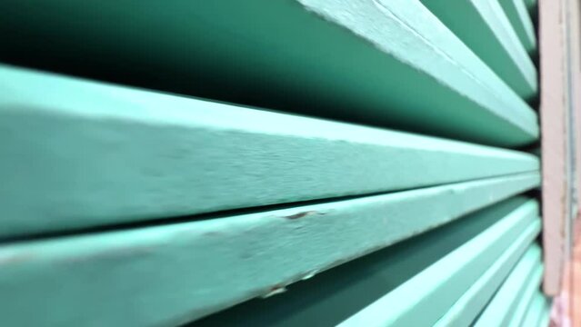 Plasterboard boards or sheetrock stacked in a warehouse of a hardware store or factory. Wide angle. Extreme close up view