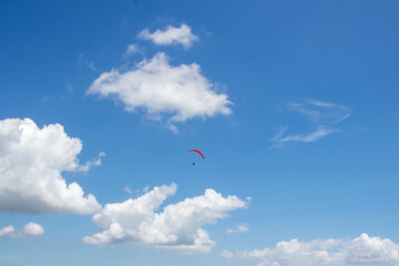 Paragliding flying in the sky