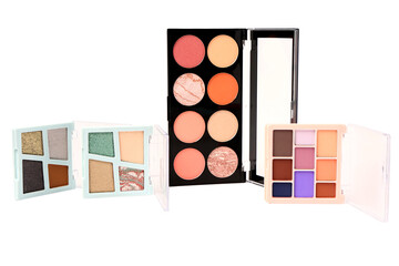Different palettes of modern eyeshadows on white background