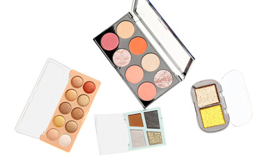 Different palettes of beautiful stylish eyeshadows on white background