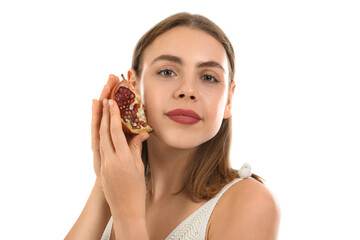 Young woman with pomegranate on white background, closeup