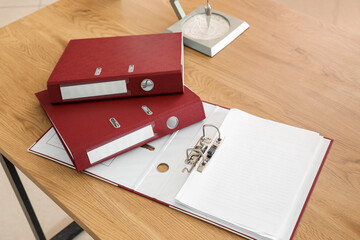 Document folders on table in office, closeup