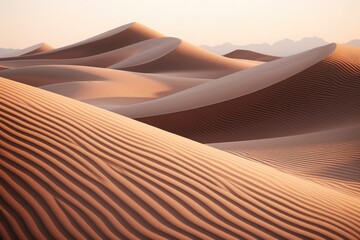 Desert landscape with sand dunes and majestic mountains in the background