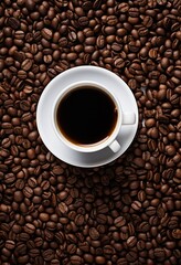 a cup of coffee on a bed of aromatic coffee beans