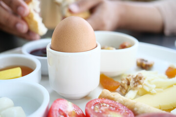 Close egg in cups for morning breakfast 