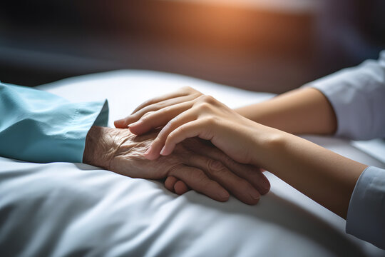 closeup hand of geriatric with nursing caregiver.