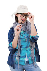 Digital png photo of caucasian woman in glasses and hat holding brush on transparent background