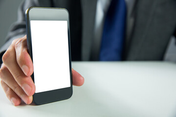 Digital png photo of caucasian businessman with smartphone, copy space on transparent background