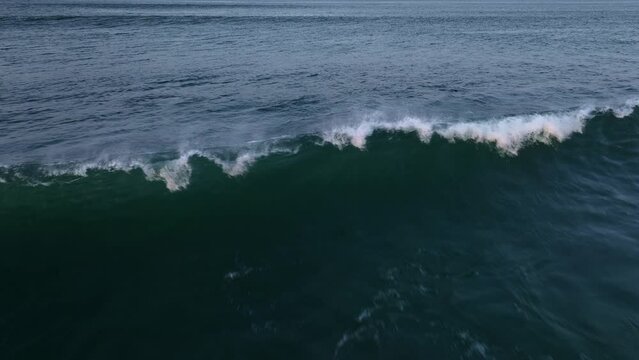 Mighty wave in slow motion, mesmerising moment of a colossal wave crashes into the ocean, surfing spot