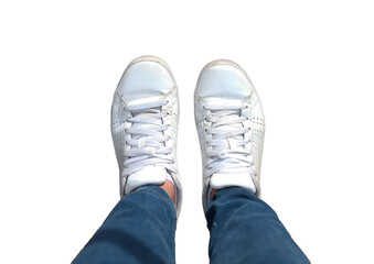 Top view of white sneakers and Blue jeans on woman legs on transparent