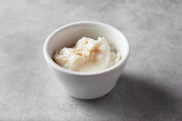 A view of a bowl of rice pudding.