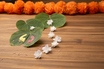 Maa Lakshmi or Godess footprint painted on apta leave. Hindu festival dasara dushera celebration....