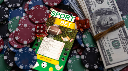 Mobile phone with bets, cards, chips, cubes and money dollars. Concept application for smartphone gambling, electronic casino online