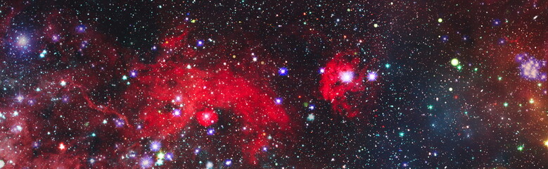 Colorful cosmos with stardust and milky way. Magic color galaxy. Infinite universe and starry...