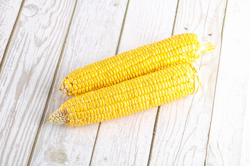Sweet yellow raw corn cob