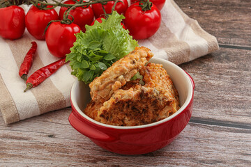 Fried salmonn cutlet in the bowl
