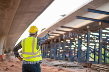 A civil engineer inspected the structure road at expressway under construction.