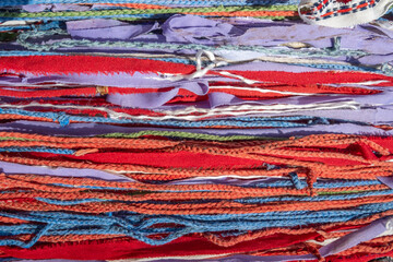 close up of colorful fabrics roupe