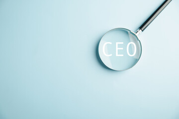Magnifying glass focuses on HR officer searching for leader and CEO. HR manager selects employee....