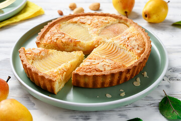 Classic Pear Frangipane Tart (Tarte Bourdaloue). Delicious Autumn and Winter pastry that is full of flavours and texture. - obrazy, fototapety, plakaty