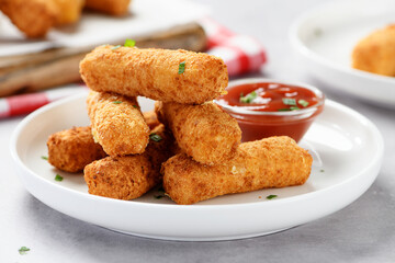 Breaded fried mozzarella cheese sticks with tomato  dipping sauce. - 662175907