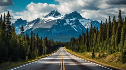 A road leading to a majestic mountain range - obrazy, fototapety, plakaty