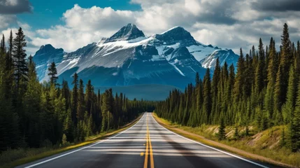 Zelfklevend Fotobehang Canada A road leading to a majestic mountain range