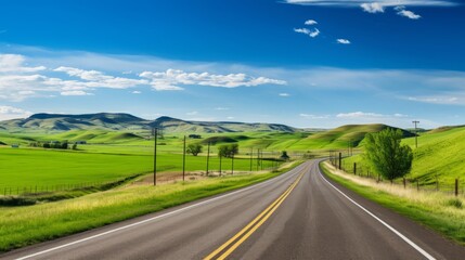 Fototapeta na wymiar A scenic road with rolling hills and farmland